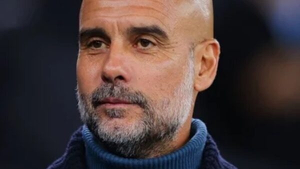 Técnico Pep Guardiola durante partida do Manchester City